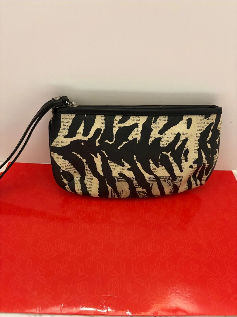 L.A.M.B. Black and Cream Zebra-Print Clutch with Logo Plate